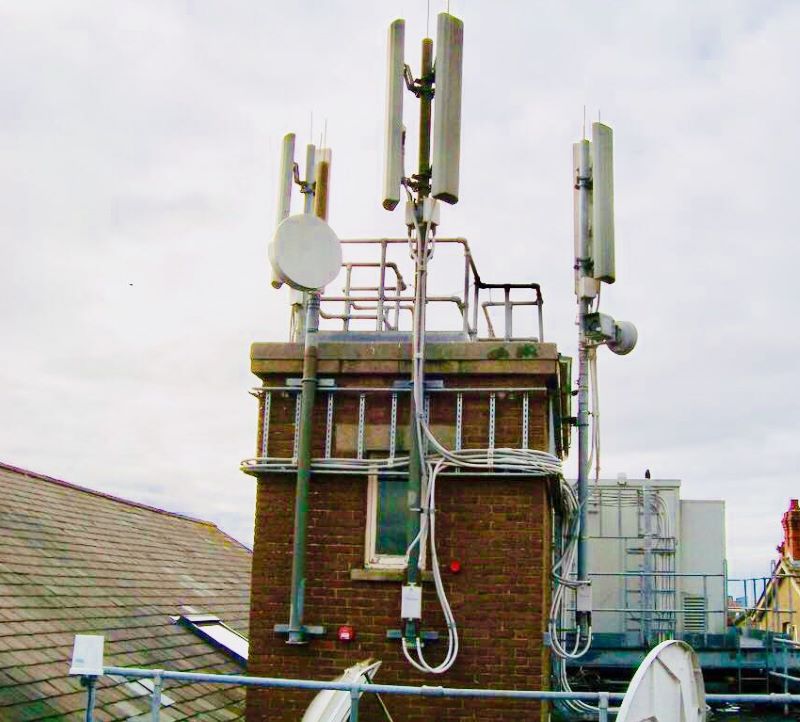 Telecoms mast, on rooftop of 23 Cowell Street, Llanelli, SA15 1UU