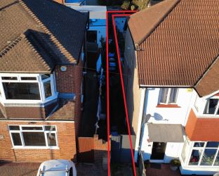Land between 21 & 19 Porlock Road, Enfield, Middlesex, EN1 2NH