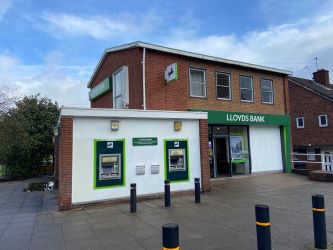 Freehold retail investment opportunity with flat above in Maypole