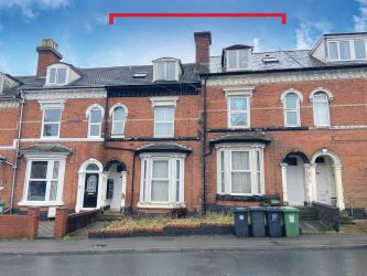 Mid terraced property converted into six flats in Redditch