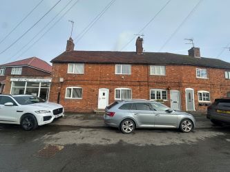 3 bedroom double fronted end terraced property in Woiston. 