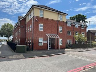 A substantial purpose built block of 18 self contained flats situated in Tipton