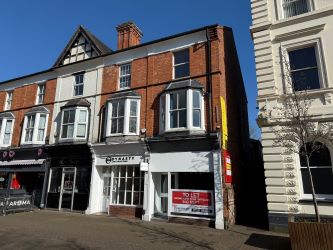 Freehold town centre office/retail building with flat to the rear in Redditch