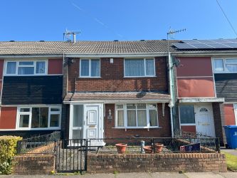 A vacant freehold mid terraced property