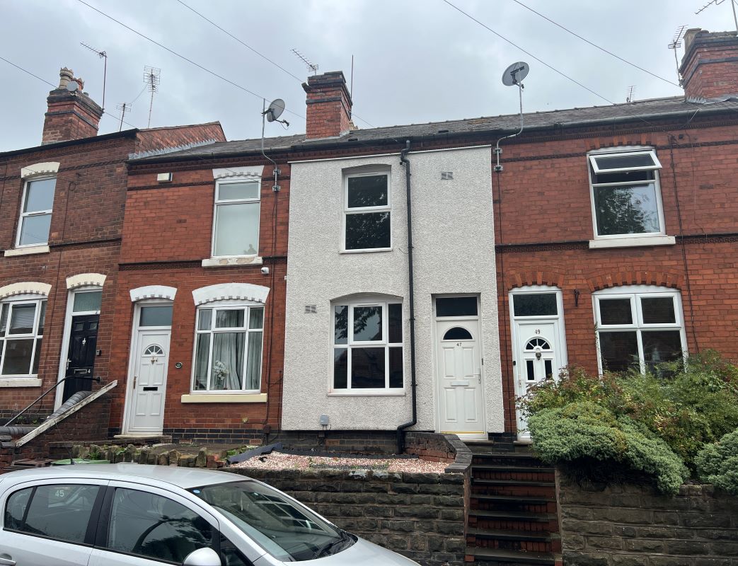 Vacant Freehold Mid Terraced Property