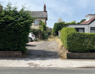 A Freehold, ‘L’ shaped, parcel of land.