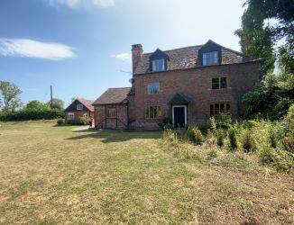 Grade II Listed semi detached property in Bushley.
