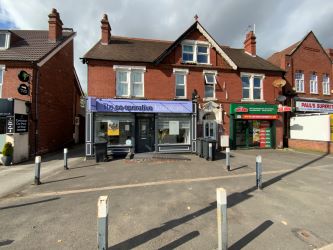 Freehold retail investment property currently occupied by Co-Op Funeralcare with flat above in Wolverhampton