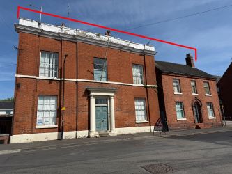 Grade II Listed former police station comprising two inter-linked buildings, a range of outbuildings and car parking in Uttoxeter