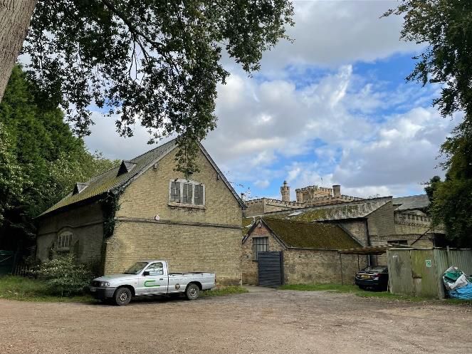 A former manor house with associated outbuildings in Brough