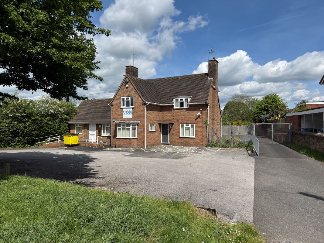 A vacant detached former Police House and offices in Codsall