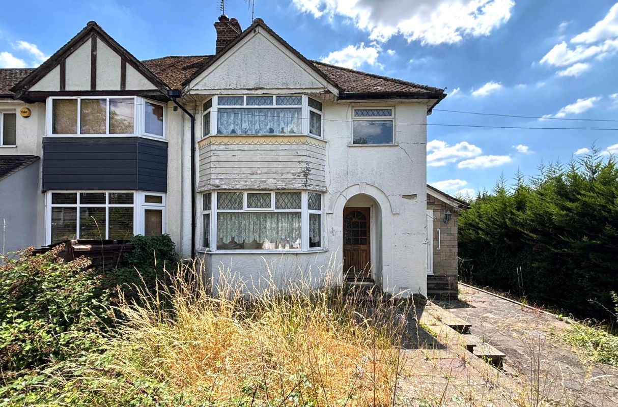 Freehold House and Garage Vacant Possession