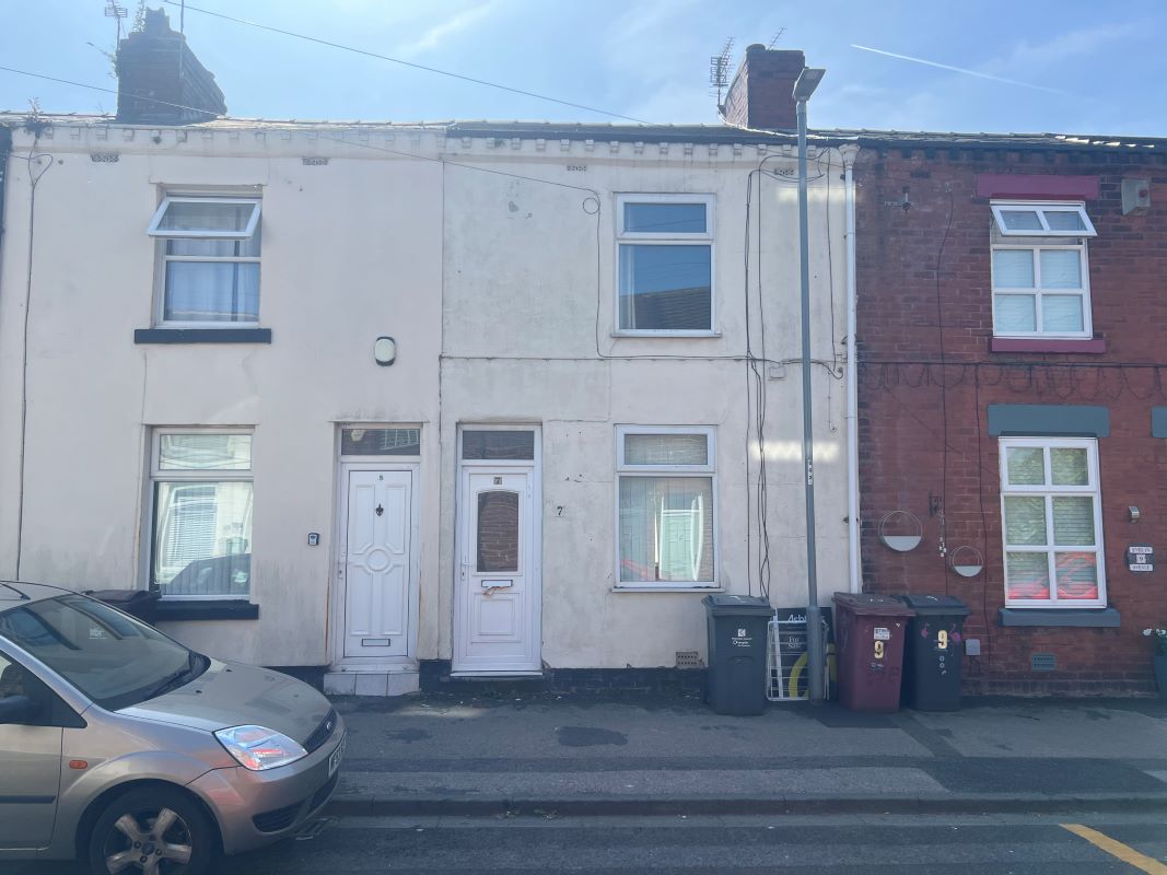 A Three Bedroom Mid Terrace House In need Of Refurbishment
